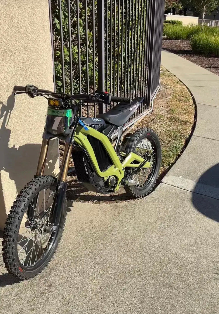 Sur-Ron Ultra Bee in factory lime green with Arizona Tea number plate decal and E-Moto Decals fork graphics
