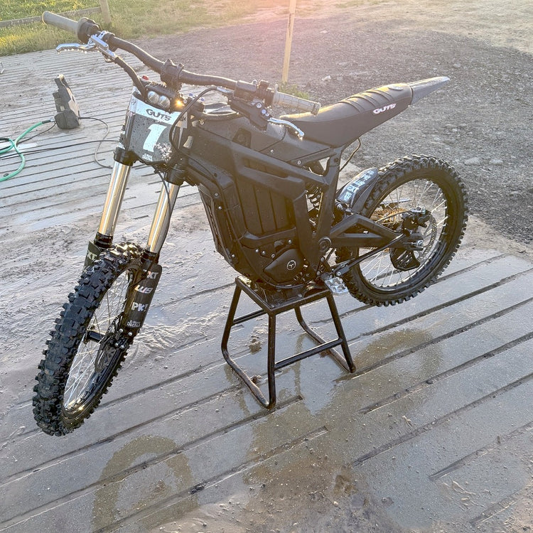 Talaria e-moto with E-Moto Decals fork graphics and custom number plate decal at sunset